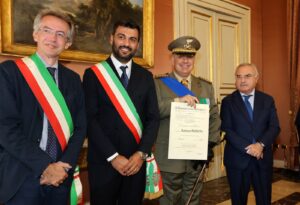 la consegna